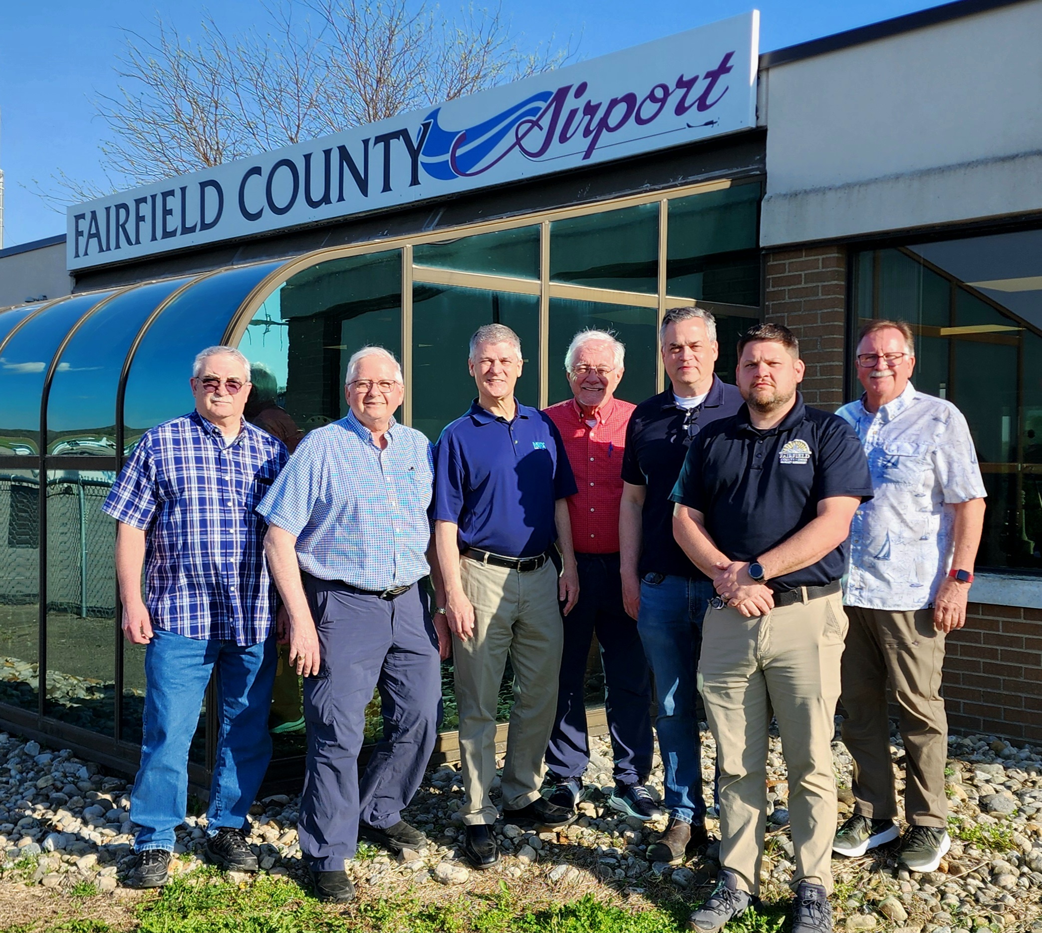Fairfield County Airport Authority Board members outside the airport terminal